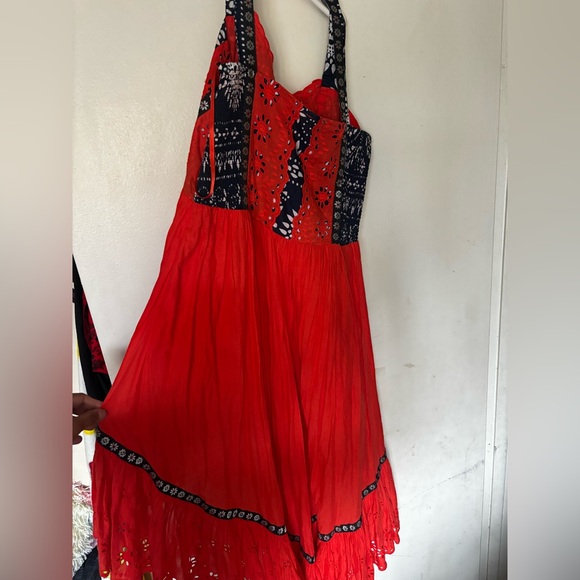 This image features the Free People Bossa Nova Eyelet High Low Dress - Picture 7 of 13